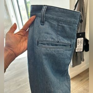 Tags on wide leg Jean trousers